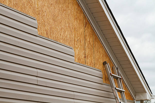 Professional Storm Damage Siding Repair technician working in Elgin, OR